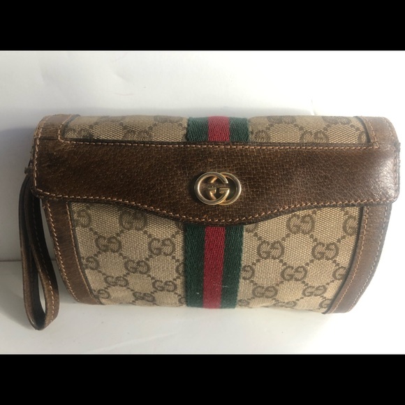 Gucci Handbags - Gucci Vintage Authentic Rare Collectible GG Iconic logo Clutch with Wristlet